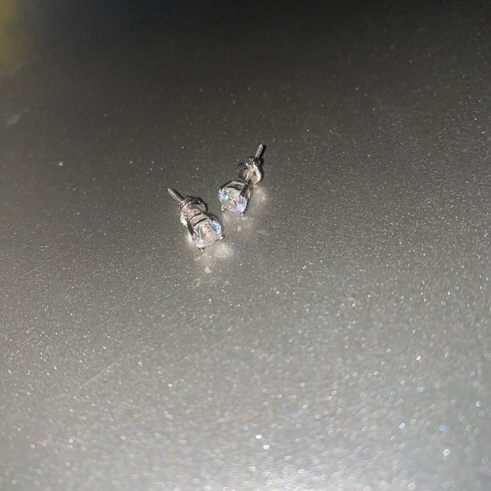Sterling silver setting white sapphire studs